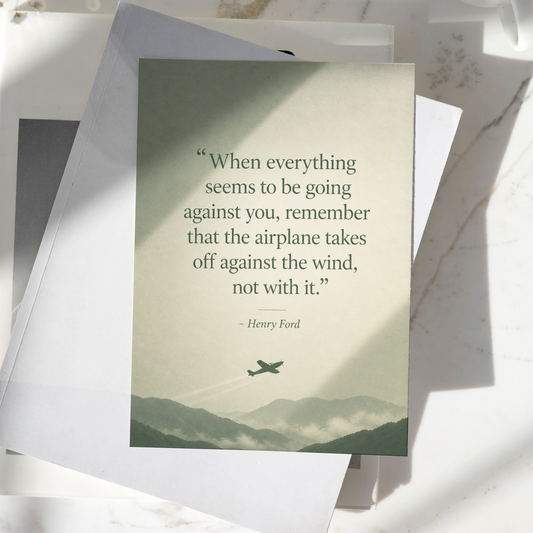 Henry Ford motivational quote poster displayed on a desk, featuring a vintage airplane silhouette and mountain landscape, premium inspirational wall art print.