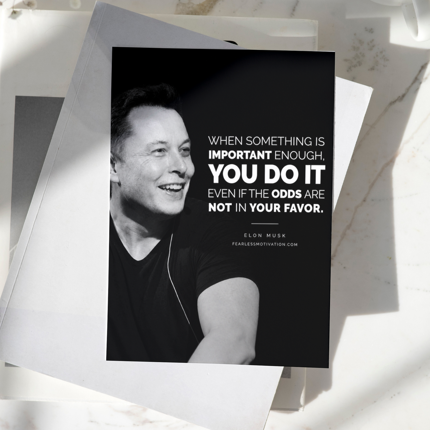 Elon Musk motivational poster displayed on a desk, featuring an inspirational quote about persistence and determination, premium entrepreneur wall art print.