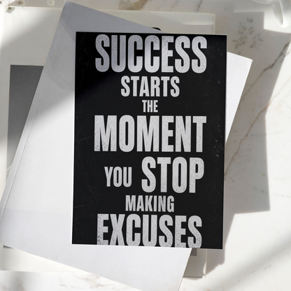 Success Starts The Moment You Stop Making Excuses motivational poster displayed on a desk, featuring bold typography and premium inspirational wall art design