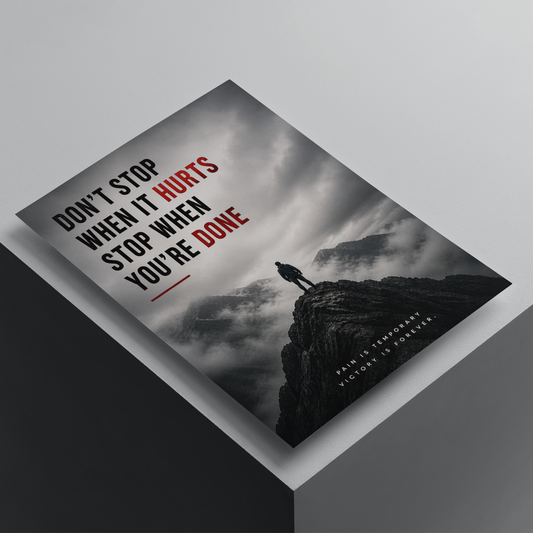 Don't Stop When It Hurts, Stop When You're Done motivational poster featuring a lone figure on a mountain cliff, premium inspirational wall art for discipline and perseverance