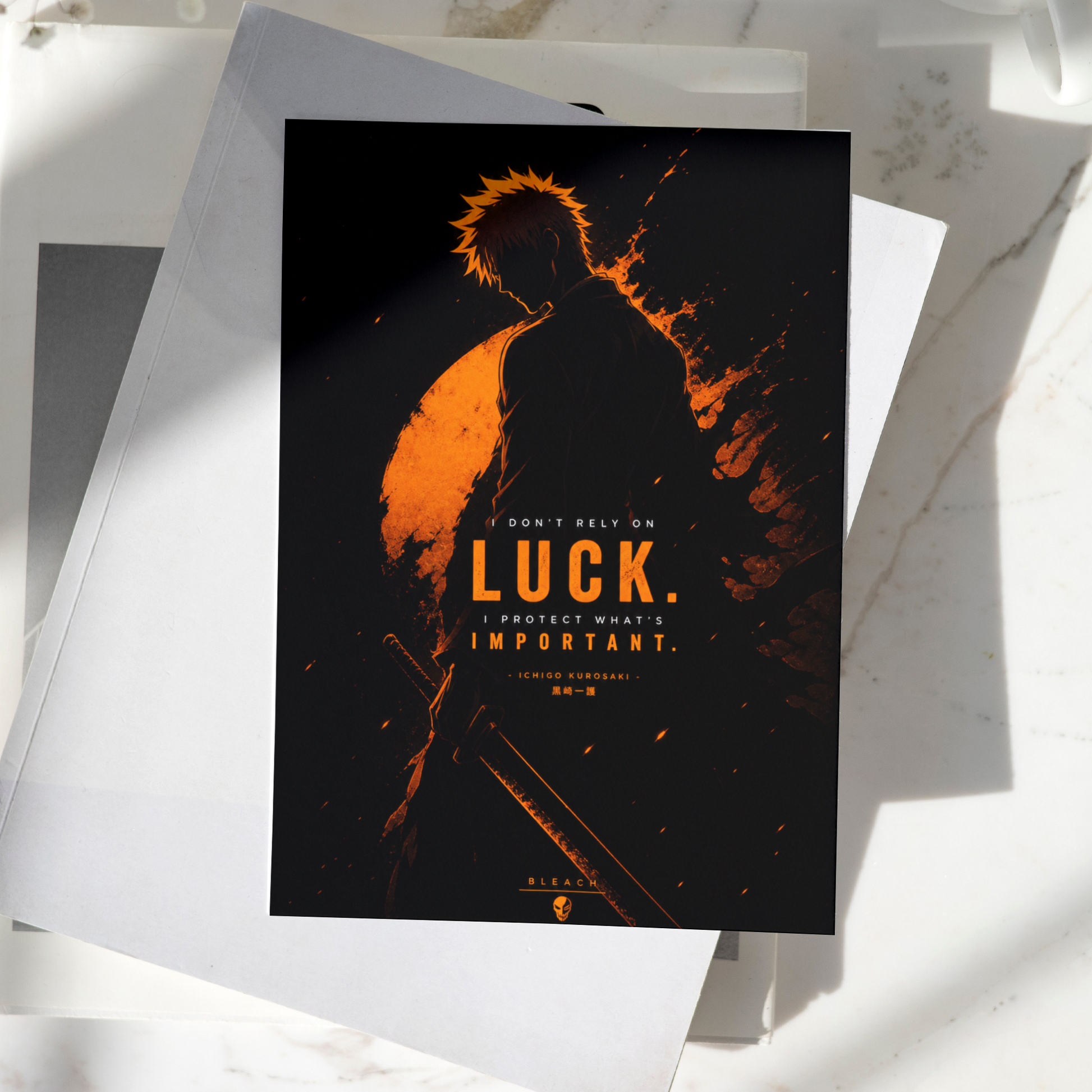 Ichigo Kurosaki Luck Is Important poster displayed on a desk, featuring dark orange silhouette artwork inspired by Bleach, premium anime wall art print