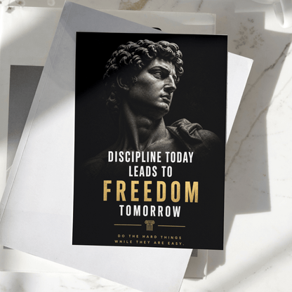 Discipline Today Leads to Freedom Tomorrow motivational poster displayed on a desk, featuring a classical statue sculpture and inspiring typography, premium wall art print