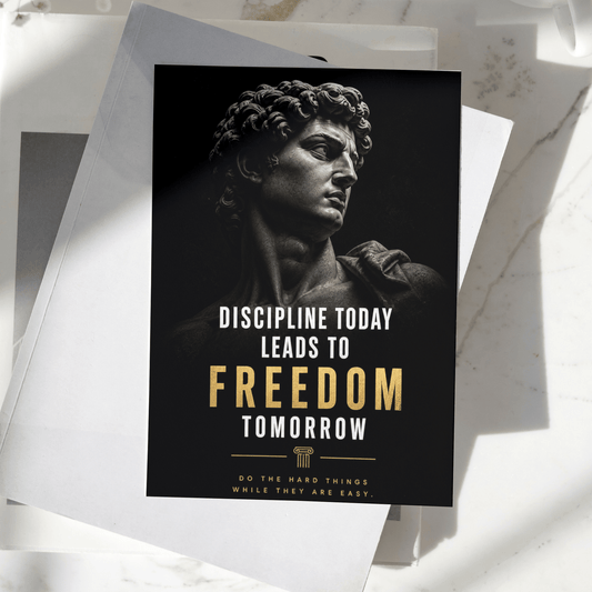 Discipline Today Leads to Freedom Tomorrow motivational poster displayed on a desk, featuring a classical statue sculpture and inspiring typography, premium wall art print