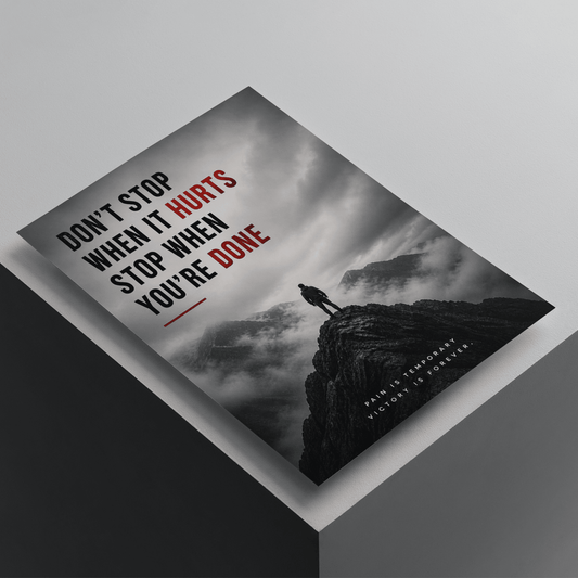 Don't Stop When It Hurts, Stop When You're Done motivational poster featuring a lone figure on a mountain cliff, premium inspirational wall art for discipline and perseverance